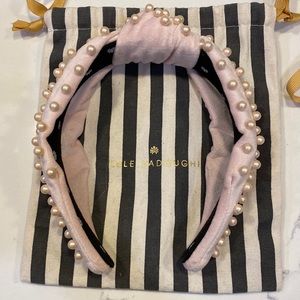 Lele Sadoughi pink headband with pearls.